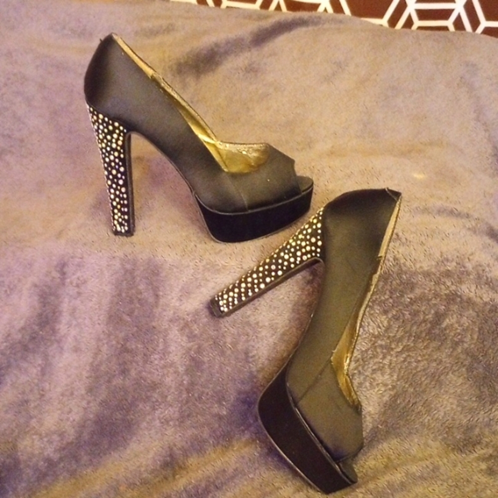 High heels Steve Madden size seven and a half satin black